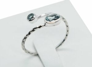 Silver Ring Twist Cut Topaz